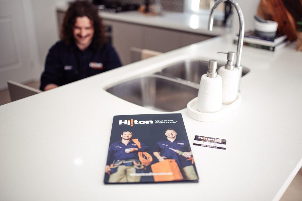 Plumber repairing a sink in Darling Downs